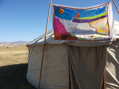 HCSM Banner Over Yurt at BBF2012.jpg