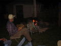 Thumbnail for File:Brother Gregory eating by the campfire.jpg